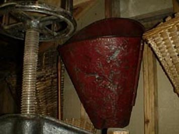 large photo of vintage metal grape carrier