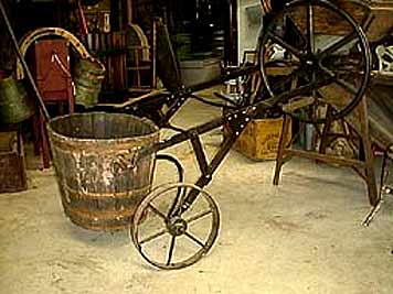 large photo of vintage cast iron grape transport